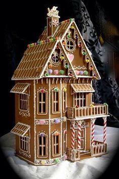 a gingerbread house with candy and candies on it