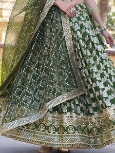 Introducing our stunning "charming green embroidered jacquard mehendi wear lehenga choli", the perfect outfit for all your special occasions. This green lehenga set features intricate sequin and embroidered work on a luxurious jacquard fabric, giving it a rich and elegant look. The set includes a green color jacquard lehenga with a 3.5-meter flair, a matching jacquard choli with sequin and embroidered work, and a beautiful organza dupatta with sequin and embroidered lace borderwork.
This lehenga Festive Green Sharara With Cutdana, Green Floor-length Traditional Wear With Cutdana, Festive Green Cutdana Sharara, Green Chanderi Lehenga With Cutdana, Diwali Green Sharara With Cutdana Details, Green Art Silk Sharara With Cutdana, Green Lehenga With Cutdana In Traditional Drape, Green Semi-stitched Lehenga With Dupatta, Semi-stitched Green Lehenga With Dupatta