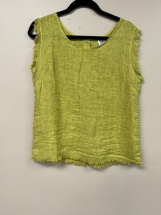 Elevate your wardrobe with our Italian Linen Distressed Hem Tank Top! Made with premium linen, it offers a comfortable and loose fit, perfect for any body size (s-l). The buttoned back, scoop neckline and distressed hem add a touch of style to this basic, versatile piece. Easy to wear, easy to love! Chic Beach Tops With Frayed Hem, Casual Linen Tank Top For Everyday, Casual Everyday Linen Tank Top, Spring Beach Tops With Frayed Hem, Beach Tops With Frayed Hem, Summer Tops With Frayed Hem In Relaxed Fit, Summer Tops With Frayed Hem And Relaxed Fit, Spring Green Washed Tops, Casual Washed Summer Tank Top