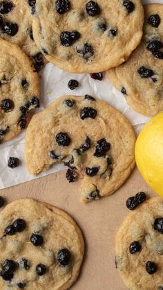 several cookies with blueberries and lemon on top