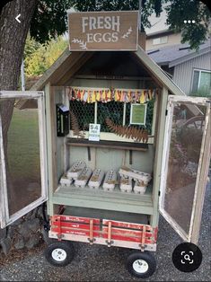 an old fashioned cart with eggs in it