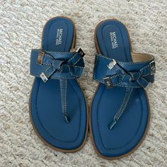 Blue Michael Kors Sandals New Without Tags. Size 6.5 Great Material Good Quality Sandals. Never Worn Blue Flat Sandals With Cushioned Footbed, Blue Leather Sandals For Vacation, Blue Flat Heel Sandals With Cushioned Footbed, Blue Toe Post Sandals For Vacation, Michael Kors Sandals For Beach In Spring, Blue Leather Toe Post Sandals, Michael Kors Casual Sandals With Cushioned Footbed, Michael Kors Sandals For Spring Beach Outings, Blue Leather Vacation Sandals