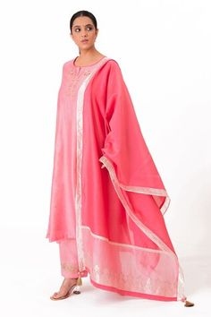 Lotus pink A-line kurta with embroidery along the neckline and sleeves. Paired with a pant and tissue applique work dupatta. - Aza Fashions Embroidered Chanderi Palazzo Set, Pink Cotton Silk Kurta With Embroidered Border, Pink Palazzo Set With Embroidered Border And Straight Kurta, Pink Traditional Wear With Embroidered Border In Cotton Silk, Traditional Pink Palazzo Set With Embroidered Border, Pink Embroidered Palazzo Set For Diwali, Pink Straight Kurta Anarkali Set With Embroidered Border, Pink Cotton Silk Sets With Embroidered Border, Pink Cotton Silk Dupatta With Embroidered Border