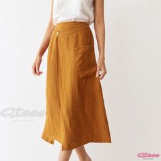 Relaxed Fit Solid Color Midi Skirt with Elastic Waistband and Large Pockets Summer Wrap Skirt With Pockets, Beach Skirt Bottoms With Pockets, Beach Skirt With Pockets, Casual Relaxed Wrap Skirt With Pockets, Casual Wrap Skirt With Pockets And Relaxed Fit, Wide Leg Beach Skirt With Pockets, Casual Solid Yellow Skirt, Beach Skirt With Pockets And Wide Leg, Summer Long Wrap Skirt With Pockets