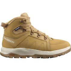 a pair of yellow hiking boots with laces on the outstep and sole