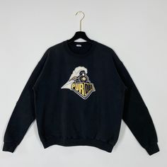 Vintage 90s Purdue University Sweatshirt Purdue Crewneck Purdue Boilermakers Sweater Pullover Purdue Boilermakers Embroidered Logo Medium Brand Name :- Purdue University Tag Size :- Fits Medium Manual Measurement :- WIDTH (armpit to armpit) :- 24 inches / 61cm LENGTH (shoulder to end of garment) :- 25 inches / 64cm Condition :- Used Good Condition 8/10. No Hole, No Stain. Tag Missing.                     - Colors Might Be Different Due To Lighting. DHL EXPRESS = 3-6 business day arrived **WE NOT Vintage Crew Sweater With Embroidered Logo, 90s Style Crew Neck Sweatshirt With Embroidered Graphics, Vintage Cotton Sweater With Embroidered Graphics, 90s Embroidered Top For Streetwear, Vintage Crew Sweatshirt With Embroidery, Vintage Crew Neck Sweater With Embroidered Graphics, Vintage Embroidered Crew Sweatshirt, Vintage Sweater With Embroidered Logo For College, Vintage Embroidered Crew Neck Sweatshirt