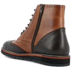 The Elijah boot by Thomas & Vine is crafted with authentic leather and wingtip details for an upscale look. A classic lace-up closure with brogue accents secures this well-made ankle-high style. The style is completed with a 6 mm Comfort Foam� footbed and a modern EVA outsole for a light and comfortable fit. Vintage Lace-up Boots With Brogue Detailing, Brown Goodyear Welted Lace-up Boots For Fall, Formal Wingtip Lace-up Boots For Winter, Fall Lace-up Boots With Brogue Detailing And Round Toe, Fall Lace-up Brogue Boots With Round Toe, Fall Lace-up Boots With Brogue Detailing, Winter Formal Lace-up Boots With Brogue Detailing, Wingtip Leather Chelsea Boots For Fall, Leather Wingtip Chelsea Boots For Fall