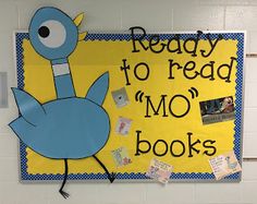 a bulletin board that reads ready to read mo'books with a blue bird on it