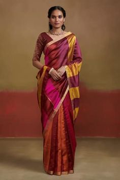 Orange, maroon and pink handloom silk saree with broad stripe pattern. Comes along with unstitched blouse piece. - Aza Fashions Multicolor Pre-draped Saree With Zari Work, Tissue Silk Blouse Piece For Navratri, Navratri Tissue Silk Blouse Piece, Elegant Multicolor Blouse Piece For Puja, Navratri Dresses With Zari Weaving, Traditional Drape Dress For Puja, Multicolor Pre-draped Saree With Pallu, Multicolor Cotton Silk Pre-draped Saree For Wedding, Wedding Multicolor Cotton Silk Pre-draped Saree