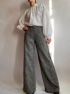 Very cool vintage wide leg trousers . 1970s  wool pants. Really great vintage item which still looks modern. Fully lined. Unfortunately pants have no tags, so I'm giving measurements below, but I don't have doubts regarding fabric. In excellent condition.  Material: 100% wool, lining 100% acetate (Measurements taken flat without stretching) Waist 33 cm/ 12.9 in  Hips 52 cm/ 20.4 in Rise 28 cm/ 11 in  Length 105 cm/ 41.3 in Friendly reminder: *the color might be a little different in real life because of couple reasons: 1. usually photos are taken with professional light 2. your monitor display may change the color a little bit Gold Evening Dresses, Womens Trousers, Friendly Reminder, 50s Dresses, Pantalon Large, Pants Wide Leg, Embroidered Jacket, Dress Purchase, Wool Pants