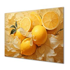 a group of lemons sitting on top of each other in front of yellow flowers