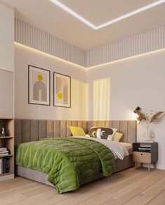 a bedroom with a bed, nightstands and pictures on the wall