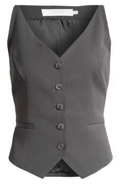 Add a crisp, classic element to your wardrobe with this button-front vest in a tailored silhouette that's perfect for wearing solo or layering. Front button closure V-neck Front welt pockets Lined 100% polyester Dry clean Imported Chic Business Vest With Button Closure, Tailored Solid Vest For Work, Tailored Vest With Button Closure For Business Casual, Notch Lapel Vest With Buttons For Business Casual, Fitted Vest With Buttons For Business Casual, Tailored Business Casual Vest With Button Closure, Business Casual Vest With Notch Lapel And Buttons, Fitted Business Casual Vest With Buttons, Business Casual Notch Lapel Vest With Button Closure