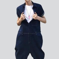 Welcome to the 2023 Spring-Summer Collection! Step up your street style with our one-of-a-kind navy denim overalls ââ‚?designed with dark wash. baggy fit. and button closure features to make a bold statement.Why Our Navy Denim Overalls Are a Must-Have Dark Wash for a Timeless Look: Make a statement with this shade of navy blue ââ‚?perfect for a night out or a day in the park. Baggy Fit for Comfort: Get the perfect fit with this relaxed silhouette ââ‚?designed to keep you comfortable all day long Summer Utility Relaxed Fit Jeans, Casual Dark Wash Denim Shortalls, Casual Short Sleeve Overalls With Button Closure, Casual Overalls With Button Closure, Casual Overalls With Button Closure And Short Sleeves, Casual Dark Wash Overalls For Streetwear, Trendy Relaxed Fit Short Sleeve Overalls, Dark Wash Relaxed Fit Denim Jumpsuit With Button Closure, Cotton Utility Denim Jumpsuit With Button Closure