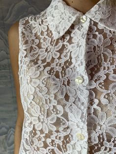 "Ivory White Lace Vintage blouse Sheer Lace Blouse Button Up Summer Blouse Floral Vintage Romantic Bohemian Medium to Large Size N.B. Color may slightly differ from picture. Estimated size: M/L Measurements (laying flat): Bust: 21,5\" / 54 cm Waist: 25\" / 64 cm Length: 28\" / 71 cm Please check measurements to insure a proper fit. Remember to allow yourself some extra room for movement. You can compare these with something from your closet that fits you well. Please convo me if you need additio Chic Lace Button-up Blouse, Elegant Collared Lace Blouse, Collared Lace Blouse With Lace Top, Spring Wedding Button-up Blouse, Elegant Lace Work Blouse For Daywear, Lace Button-up Blouse For Party, Lace Button-up Party Blouse, Feminine Blouse With Button Closure And Collar, Feminine Blouse With Collar And Button Closure