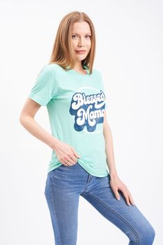 This retro print Blessed Mama shirt is a great graphic t-shirt that fits like a well-loved favorite. Whether you keep it casual or dress it up, this super soft shirt is comfortable for all occasions.A Blessed Mama graphic tee is the perfect mom gift.. Soft For Hot Mommy post-pregnancy Unisex fit Fabric: 52% cotton, 48% polyester Packaged and shipped by our all-female owned and operated business. For sizing questions, click here for our Hot Mommy and Me Sizing Guide. Retro Short Sleeve T-shirt With Graphic Print, Retro Slogan T-shirt For Spring, Retro Tri-blend Crew Neck T-shirt, Retro Cotton Tops With Graphic Print, Retro Graphic Print T-shirt For Spring, Retro Crew Neck Top With Graphic Print, Retro Graphic Print Crew Neck Top, Graphic Tee With Text Print, Trendy Green Slogan T-shirt