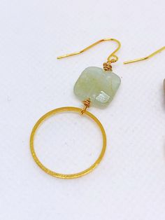 Handmade in Portland, Oregon. This will make the perfect gift! Or, definitely get it for yourself, I support that, too. MEASUREMENTS + MATERIALS - Length is about 1.5 inches - Pretty raw aquamarine gemstone - Hoop is about 1 inch in diameter - Gold fill ear wire for sensitive skin (hypoallergenic) WHAT PEOPLE SAY “Beautiful craftsmanship, these were for my mother in law, she loves them. I love supporting small businesses.” - Josh “ Love these earrings!! I get so many compliments about them when Handmade Gold Aquamarine Earrings, Modern Gemstone Hoop Earrings For Gift, Modern Gemstone Hoop Earrings As Gift, Minimalist Gold Aquamarine Jewelry, Modern Wire Wrapped Hoop Earrings For Gift, Gold Aquamarine Gemstone Earrings, Handmade Aquamarine Round Jewelry, Aquamarine Round Jewelry With Matching Earrings, Gold Aquamarine Drop Earrings