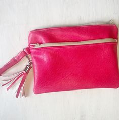 Listing is for one Cherry Red Pink Faux Leather Wristlet- Handmade Wristlet, Wristlet Purse, Wristlet for Keychain, Zippered Pouch Wrist Lanyard, Classy Zipper Wallet Made of the prettiest reddish pink faux leather. Pockets for your cash, cards or cell phone. long wrist strap so you can carry it securely all day long Just one of several handmade bags in the shop. You can see the full collection HERE: https://www.etsy.com/shop/HotWheelsAndGlueGuns?ref=seller-platform-mcnav§ion_id=48912949 - Outside made with high quality faux leather, inside is cotton fabric. Wipe clean with damp cloth to keep it looking new!  - Approximately 5x7 " - Due to the handmade nature of these items, listing photos are just an example and your pieces may have a slightly different look - Don't see what you're lookin Cheap Everyday Wristlet With Zipper Closure, Pink Clutch Wristlet As A Gift, Pink Clutch Wristlet, Pink Clutch Wristlet With Zipper Closure, Red Zipper Pouch Wristlet For Gift, Red Zipper Pouch Wristlet As Gift, Pink Wristlet With Zipper Pouch As Gift, Red Wristlet With Zipper Pouch As Gift, Adjustable Rectangular Red Wristlet