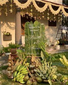 there is a sign that says welcome to the bride and groom in front of some bananas