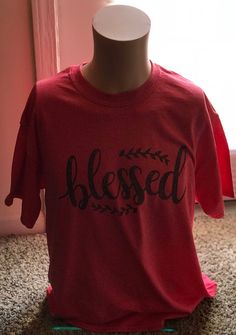 Blessed T-shirt Tee Top, Ladies Unisex Crewneck T-shirt, Blessed Mom, Gift For Mother, Unisex Custom t-shirt Available in UNISEX AND LADIES shirt sizes! You can choose your favorite color. All tees are handmade! For sizing and fit please refer to our listing images. All our Tees are made from preshrunk 100% combed ringspun cotton (heather colors are cotton/poly blend) and they are supersoft and comfortable to wear! Every Tee can withstand multiple washes in all wash temperatures as well as dryin Cotton Half Sleeve T-shirt With Letter Print, Relaxed Fit Half Sleeve T-shirt With Letter Print, Fall Half Sleeve Relaxed Fit T-shirt, Relaxed Fit Half Sleeve T-shirt For Fall, Fall Cotton T-shirt With 3/4 Sleeve, Red T-shirt With Text Print For Fall, Cotton T-shirt With 3/4 Sleeve For Fall, Relaxed Fit Crew Neck Tops With Heat Transfer Vinyl, Red Half Sleeve Cotton T-shirt