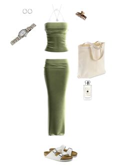 a woman's outfit with sandals and accessories