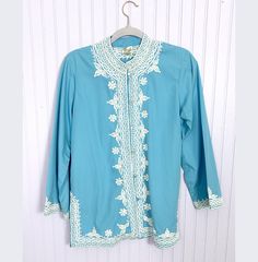 Wonderful 60's lightweight cotton top! High quality embroidery and a beautiful sky blue color. Wear as a top, coverup or lightweight jacket.  Sizing: Measured pit to pit at 20"  Length 28" So the fit would be a little loose on a size small, or slightly more fitted on a medium. Sky Blue Color, 60s Vintage, Beautiful Sky, Cotton Top, Lightweight Jacket, Cotton Tops, Womens Clothing Tops, Sky Blue, Favorite Outfit