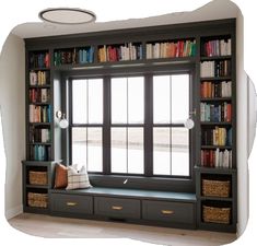 a window seat in front of a book shelf filled with books