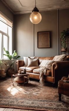 a living room filled with furniture and a large window