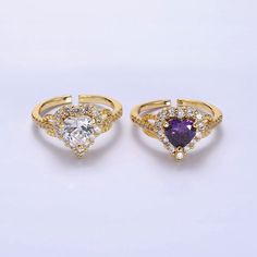 If you receive a defective item, please contact us for replacement within 5 days of arrival. Item Details - - This listing is for one ring only - Materials: Brass, 14K gold filled, cubic zirconia - Lead free, cadmium free, and nickel free - Size: US 7.0 - Adjustable, one size fits most Please avoid any water or chemical solutions. Keep the item in a dry environment. Gold Cubic Zirconia Crystal Ring For Valentine's Day, Gold Cubic Zirconia Crystal Birthstone Ring, Gold Crystal Birthstone Ring With Cubic Zirconia, Gold Birthstone Ring With Cubic Zirconia, Gold Crystal Ring With Diamond Accent Stones, Gold Cubic Zirconia Birthstone Ring With Halo Setting, Gold Crystal Diamond Ring With Accent Stones, Gold Rings With Cubic Zirconia And Accent Stones, Gold Birthstone Ring With Accent Stones For Valentine's Day