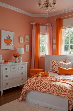 an orange and white bedroom with chandelier, bed, dresser and window curtains