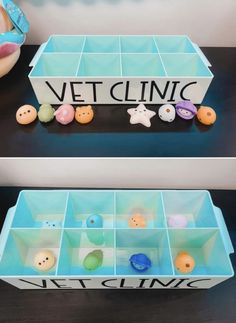 two plastic trays filled with different types of buttons and magnets on top of a table