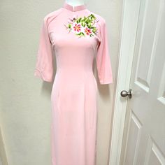 Nwot. Size M. Ao Dai Only, No Pant. Soft Pink Color With Embroidery. Please See Pictures For Details Or Any Markings/ Flaws. Let Me Know If You Need Additional Photos With Measurements. Pink Ao Dai For Evening Spring Events, Spring Evening Pink Ao Dai, Spring Formal Embroidered Ao Dai, Formal Spring Embroidered Ao Dai, Formal Embroidered Ao Dai For Spring, Embroidered Ao Dai For Spring Formal, Fitted Ao Dai For Formal Summer Events, Spring Formal Fitted Ao Dai, Soft Pink Color