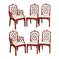 set of six chinese style chairs with white upholstered cushions