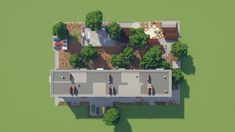 an aerial view of a house with several trees