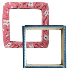 two square frames with animals on them in pink and blue colors, one is made out of fabric