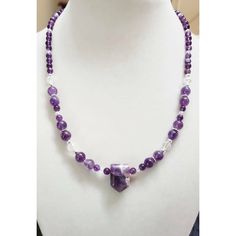 Amethyst faceted arrow gemstone choker necklace is made with 4mm amethyst gemstone spacer beads. 6mm amethyst gemstone spacer beads with silver flower spacer beads in between the 6mm gemstone beads. 3mm and 6mm briolette crystal glass spacer beads and 3mm silver round spacer beads. The necklace is 16inches long with a 1.5 extender chain to make the necklace longer if desired. 💜 Purple Faceted Amethyst Crystal Necklaces, Faceted Amethyst Healing Necklace, Faceted Amethyst Spiritual Gemstone, Purple Faceted Amethyst Crystal Necklace, Spiritual Faceted Amethyst Crystal Necklace, Silver Beaded Necklaces With Faceted Amethyst, Silver Beaded Necklace With Faceted Amethyst Beads, Silver Amethyst Beaded Necklace With Faceted Beads, Spiritual Purple Faceted Necklace