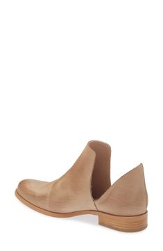 A sleek and chic bootie combines Western style and Chelsea boot influences to gorgeous effect. Made from supple leather, this slip-on style features a two-piece construction and low, stacked heel. 1" (25mm) heel. 3 1/2" shaft height. Leather upper and lining/rubber sole. By Cordani; imported. Salon Shoes. Slip-on Boots In Calf Leather For Fall, Slip-on Calf Leather Boots For Fall, Fall Slip-on Boots In Calf Leather, Spring Chelsea Ankle Boots With Leather Sole, Spring Chelsea Boots With Leather Sole, Chic Spring Boots With Leather Footbed, Chic Leather Boots With Leather Sole, Spring Ankle-high Calf Leather Boots, Chic Ankle Booties With Stacked Heel