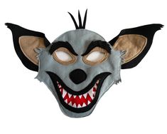 an animal mask with teeth and fangs on it