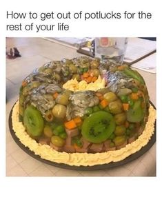 a cake covered in lots of different types of vegetables