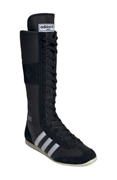 This sneaker pushes the boundaries of the expected, taking inspiration from the brand's archival Knockout boxing boot. Bringing undeniable drama to the boxing aesthetic, it has a suede-and-nylon upper with contrast 3-Stripes, all sitting on top of a low-profile rubber sole. Lace-up style Textile and leather upper/textile lining/rubber sole Imported Boxer Boots, Boxing Aesthetic, Adidas Japan, Boxing Boots, Up Styles, Cream White, Boxing, Low Profile, Boundaries