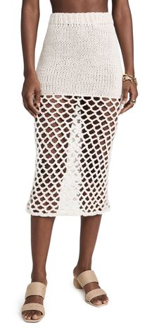 Find Nia Thomas Duda Skirt on Editorialist. Fabric: Mid-weight knit. Covered elastic waistband. Open knit hem. Shell: 100% cotton. Unlined. Wash cold. Imported, Peru. Measurements: Measurements from size XS Length: 32.75in / 83.0cm Elegant Crochet, Crochet Midi, Latest Skirts, Floral Crochet, Cargo Skirt, Fashion Elegant, Open Knit, Skirt Outfits, Elegant Fashion