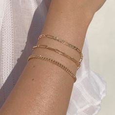 Our Figaro chain bracelet is a gold staple to wear alone or stack with our other gold filled bracelets. Our 14k gold-filled jewelry is plated with real 14k gold over brass and is water and tarnish resistant. 14k gold-filled jewelry is a great alternative to solid gold, and can be worn by people with sensitive skin. The color will not tarnish but recommend to keep away from liquids, perfumes and lotions. BUY 2, GET 1 FREE. Coupon applied at checkout. - 14k gold-filled- Chain width: 3.5 mm. - Chai Permenant Bracelet Gold, Gold Trendy Stackable Chain Bracelet, Trendy Gold Stackable Chain Bracelet, Gold Bangle Chain Bracelet In 14k Gold Filled, Gold 14k Gold-filled Stackable Chain Bracelet, Gold Bangle Chain Bracelet, 14k Gold Filled, Dainty Gold Paperclip Bangle Bracelet, 14k Gold Filled Rose Gold Jubilee Chain Bracelet, 14k Gold Figaro Chain Bracelet For Everyday