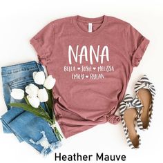 Nana Shirt, Personalized Nana T-shirt, Nana-life Shirt, Grandmother Shirt, Mother's Day Shirt, Grandma Shirt With Grandkids Names, Nana Tee Welcome to AuroraConceptDesign! ❤️ 👉🏻 PROCESSING TIME: - 3-5 business days. - Please contact with us if there is a rush order. 👉🏻 DELIVERY TIME: - Standard Shipping:  3-5 business days - Expedited Shipping  1-3 business days 👉🏻 CARE INSTRUCTIONS: - Machine wash cold and tumble dry low.  - Do not iron directly onto the design. - Do not bleach. We offer wide variety of products, including Unisex T-shirts, Women's V-neck T-shirts, Unisex Long Sleeve T-shirts, Youth T-shirts, Toddler T-shirts, and many more. Swipe listing images and check all the colors available for each type of shirt. Please enter the shirt and text color desired for your shirt in Nana Tee Shirts, Family Matching Cotton T-shirt Gift, Family Matching Soft-washed Short Sleeve T-shirt, Casual T-shirt With Text Print For Family Reunion, Family Matching Cotton T-shirts For Family Reunion, Cotton Graphic Tee For Family Reunion, Family Matching Cotton Tops For Family Reunion, Cotton Tops For Family Matching At Family Reunion, Custom Print Cotton T-shirt For Family