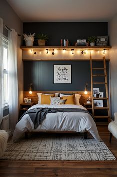 a bedroom with a ladder and lights above the bed