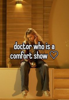 a woman sitting on top of a counter talking on a cell phone with the caption doctor who is a comfort show