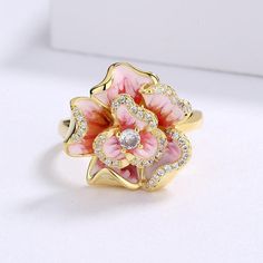 This Exquisite Pink Flower Enamel Ring is classified as Chinese Jewelry or as Art Nouveau Jewelry, which will add a touch of elegance. The Captivating Flower Design adorns your natural beauty, suitable for the occasions of Casual or Day Hangouts. Brightly Enamel is a classic choice to give as a gift or wear on life's most precious days. You can wear this Exquisite Pink Flower Enamel Ring on its own or partner with classic silhouettes for an which will add a touch of elegance pairing. TJ(trendyje Nouveau Jewelry, Chinese Jewelry, Art Nouveau Jewelry, Detailed Ring, Enamel Ring, Watch Necklace, Types Of Rings, Ring For Women, Pink Flower