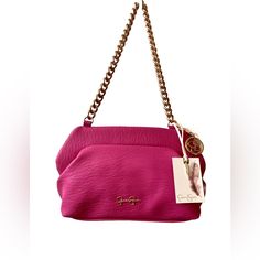 Jessica Simpson Chelsea Clutch Purse W/Gold Chain Handle/Keychain Color: Raspberry Rose The Rectangular-Shaped Bag Is Accented With A Gold Tone Chain Top Handle, Which Has A Strap Drop Of Approximately 9.5 Inches, And 2 Magnetic Snap Closures. It Features A Removeable Custom Keychain, Animal Print Signature Inner Lining, And A Name Plaque That Adds Elegance To The Design.The Purse Is Approximately 6 Inches In Height, 11 1/4 Inches In Width, And 3 Inches In Depth. The Bag Has A Large Interior Zip Pink Crossbody Flap Bag With Chain Strap, Oversized Clutch Purse, Pink Flap Bag With Gold-tone Hardware, Pink Bags With Gold-tone Hardware, Pink Rectangular Clutch With Chain Strap, Pink Crossbody Flap Bag With Gold-tone Hardware, Snakeskin Purse, Oversized Clutch, Chain Top