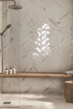 a white tiled bathroom with wooden bench and shower head