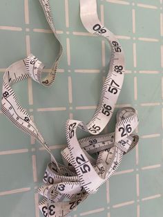 a measuring tape wrapped around a circular object