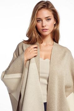 Asymmetrical poncho in light and dark brown - Himelhoch's Department Store Chic Beige Shawl For Fall, Elegant Beige Poncho For Fall, Chic Beige Cape For Spring, Chic Beige Winter Shawl, Beige Poncho For Layering, Beige Cape Shawl For Fall, Chic Beige Shawl For Spring, One Size Beige Poncho For Layering, Beige Shawl Cardigan For Fall